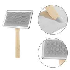  Strumento per cardare la lana