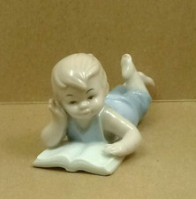 morena porcellana bimbo che legge cm 11