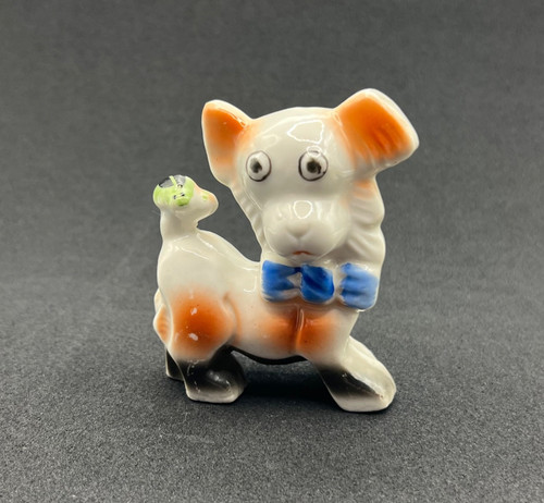 Statuina papillon cane