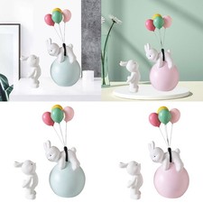 Statuina a forma di  con