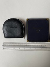 Porta spiccioli a forma di