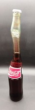 Bottiglia Coca-Cola allungata