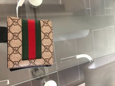 Portafoglio GUCCI uomo in buone condizioni con nastro Web