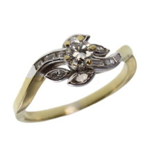 Anello con diamanti, realizzato in oro bicolore 750, diamante centrale taglio br