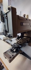 Macchina  industriale NECCHI Attacca bottoni  2 fori,4 fori,gancio. 220v