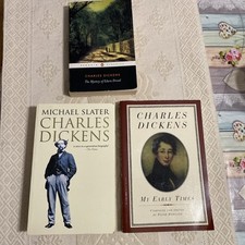 Charles Dickens and two other