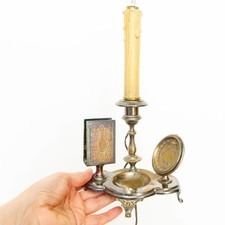 Antica lampada candela