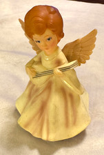Statuina angelo musicale