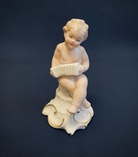 Putto con fisarmonica