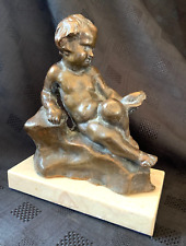 Antica figura in bronzo putti