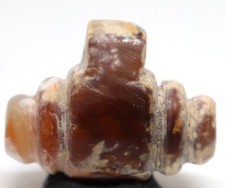 Antico amuleto in pietra