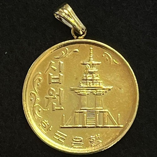 Collana con ciondolo moneta