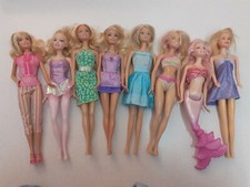 Kit Barbie assortite 9 pz. Barbie piu' accessori della  versione veterinaria