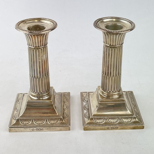 Coppia candelabri colonna - di, a