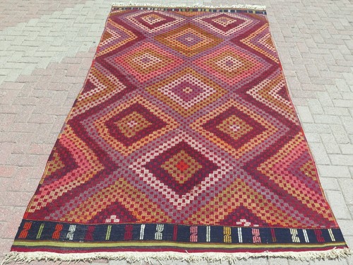 Tappeto geometrico diamante