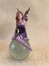 Statuina fata viola - seduta, su