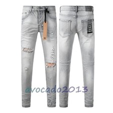 Jeans uomo KSUBI strappati