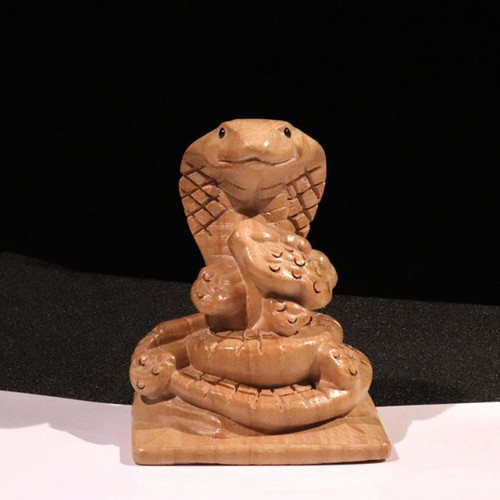 Figurina serpente legno - di,