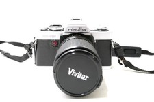 Fotocamera analogica Minolta XG9 con Vivitar 35-105mm F3.2-4