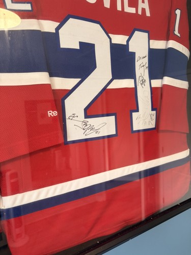 Signed hockey jersey - signed,