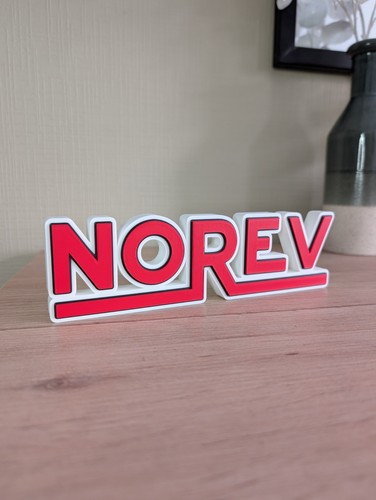 Norev logo décoratif - norev,