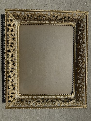 Cornice antica ornata oro