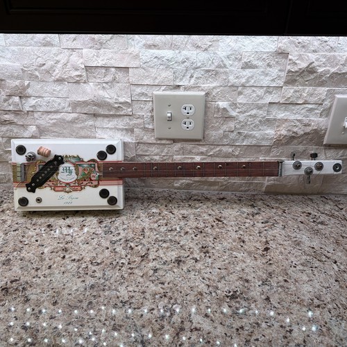 Cigar box guitar string - cigar, guitar,