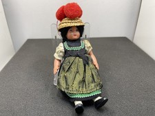 Bambola in vinile da