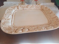 Vassoio in ceramica fatto a