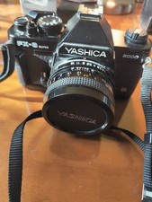 Yashica analogica FX-3 Super 2000 + obbiettivo 50mm  pellicola 35mm + flash