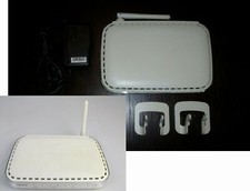 Netgear DG834v4 + Netgear DG834v5 + 2 alimentatori originali OK + 3 piedini OK