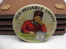 Vecchio specchio a mano in