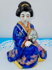 Antica statuina porcellana