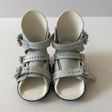 Stivali Clubfoot bretelle