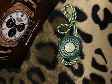 L) ROLEX GREEN HOLOGRAM BIG