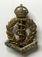 Distintivo berretto corona del re bimetallico corpo medico regio esercito britannico