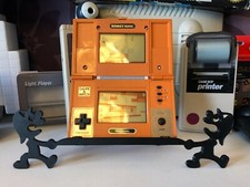 Supporto per giochi e orologi