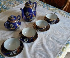 Antico servizio da tè  cinese di porcellana blu, quattro tazze con decorazioni f