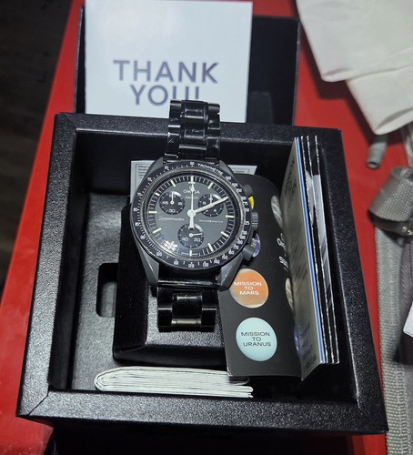 Swatch omega mission - mission, to