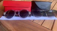 2 paia di occhiali da sole GUESS usati, ottimo stato. Astucci originali.