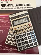 Calcolatrice commerciale/finanziaria Sharp EL-731 con manuale originale.