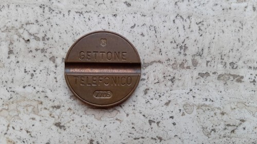 Gettone telefonico esm 7705 - gettone,