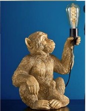 Lampada scimmia seduta dorata