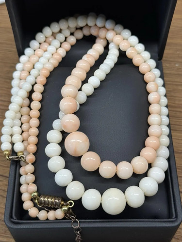 Collana corallo pelle - , di