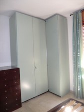 Vendo due armadi usati ad "L" ditta MOLTENI, laccati, colore verde acqua marina.