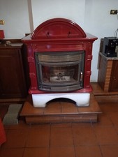 Stufa a Pellett idro Ginevra-ceramica rosso-kw15- usata-funzionante-perfetta .