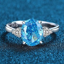 Anello a tre pietre con
