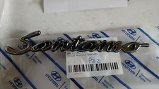 HYUNDAI SANTAMO FREGIO TARGHETTA LOGO ORIGINALE 86315M2000