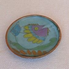 Piatto porta pesci astratto in