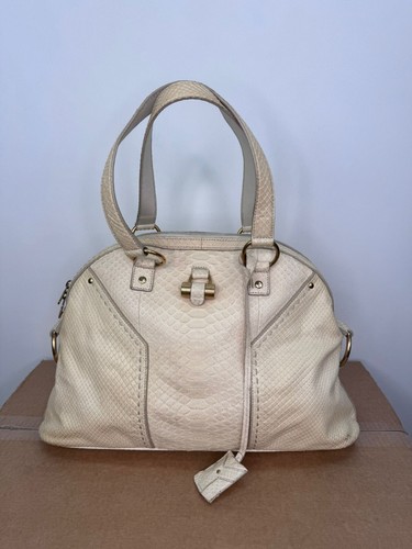 Yves saint laurent muse - laurent,